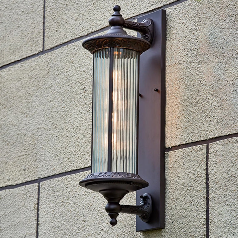 Lámpara de pared de 1 luz cilíndrica de vidrio y aluminio impermeable, estilo retro contemporáneo para jardín