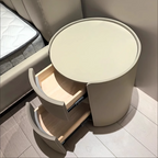 Mesita de noche moderna de lujo redonda de madera contrachapada con piel sintética y 2 cajones para dormitorio