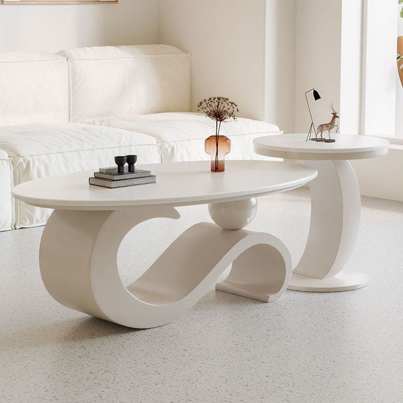 Mesa de centro ovalada contemporánea escandinava con base de acero al carbono y cubierta de piedra para sala de estar