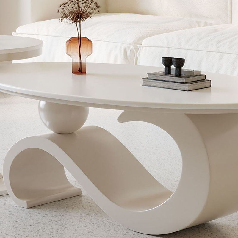 Mesa de centro ovalada contemporánea escandinava con base de acero al carbono y cubierta de piedra para sala de estar