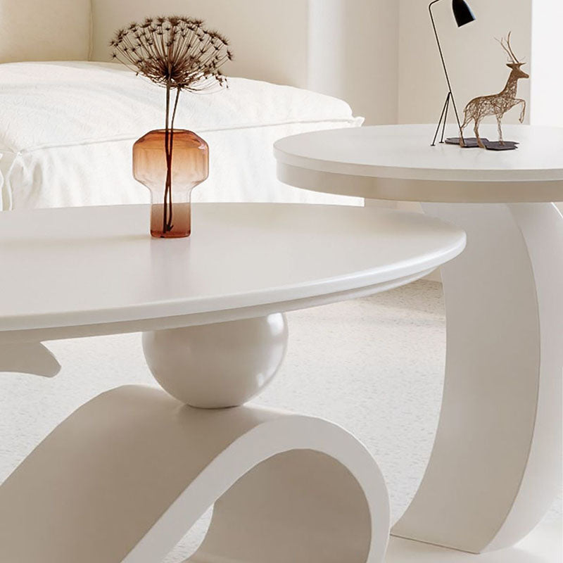 Mesa de centro ovalada contemporánea escandinava con base de acero al carbono y cubierta de piedra para sala de estar