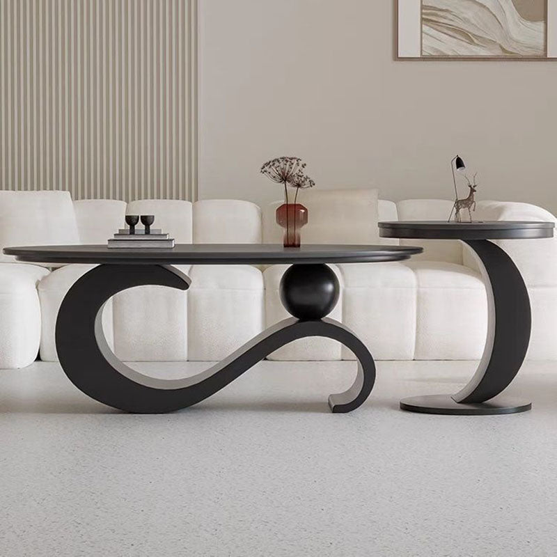 Mesa de centro ovalada contemporánea escandinava con base de acero al carbono y cubierta de piedra para sala de estar