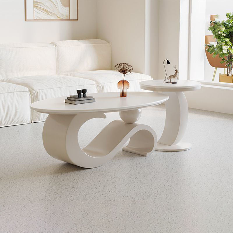 Mesa de centro ovalada contemporánea escandinava con base de acero al carbono y cubierta de piedra para sala de estar