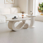 Mesa de centro ovalada contemporánea escandinava con base de acero al carbono y cubierta de piedra para sala de estar