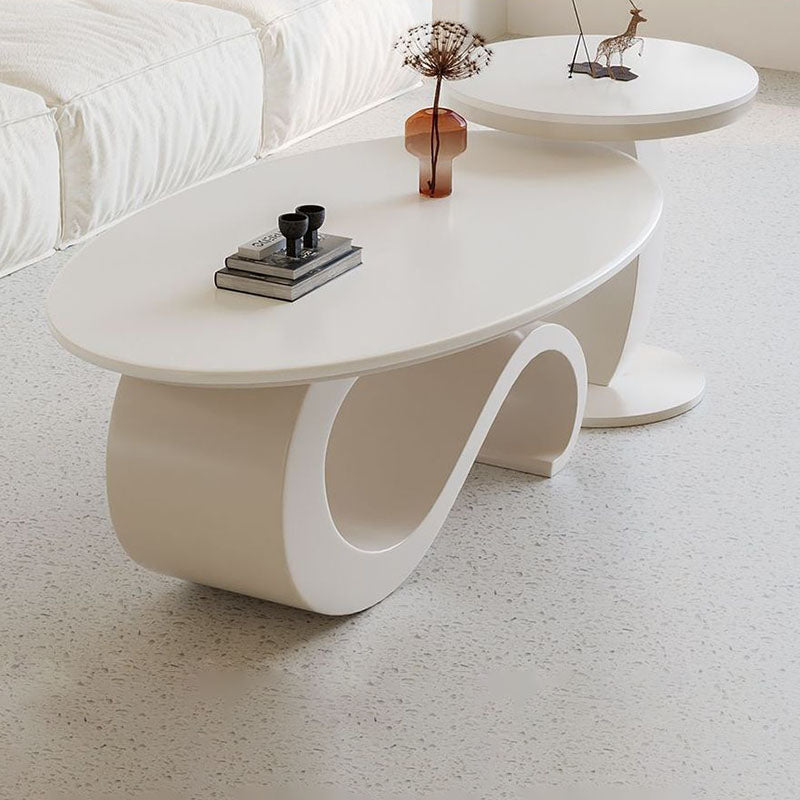 Mesa de centro ovalada contemporánea escandinava con base de acero al carbono y cubierta de piedra para sala de estar