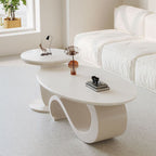 Mesa de centro ovalada contemporánea escandinava con base de acero al carbono y cubierta de piedra para sala de estar