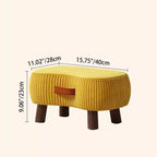 Taburete bajo de inspiración escandinava contemporánea con estructura de madera maciza y tapicería cilíndrica en forma de jabón en tejido sintético para salón